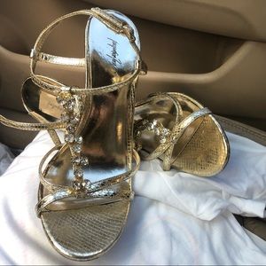 Gold strap heels. Size 9. Gently worn.